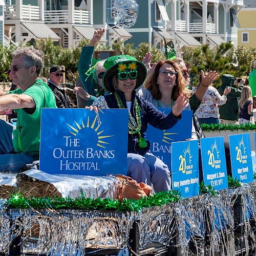 A parade float with signs reading 